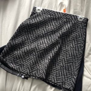 Black skirt with white lines. Like new! Buy more and bundle to save